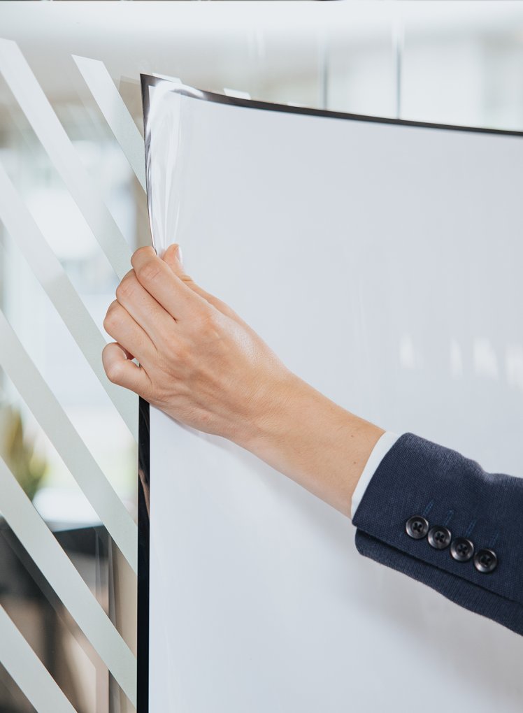 Sticking a Stick-on sheet to a glass wall 