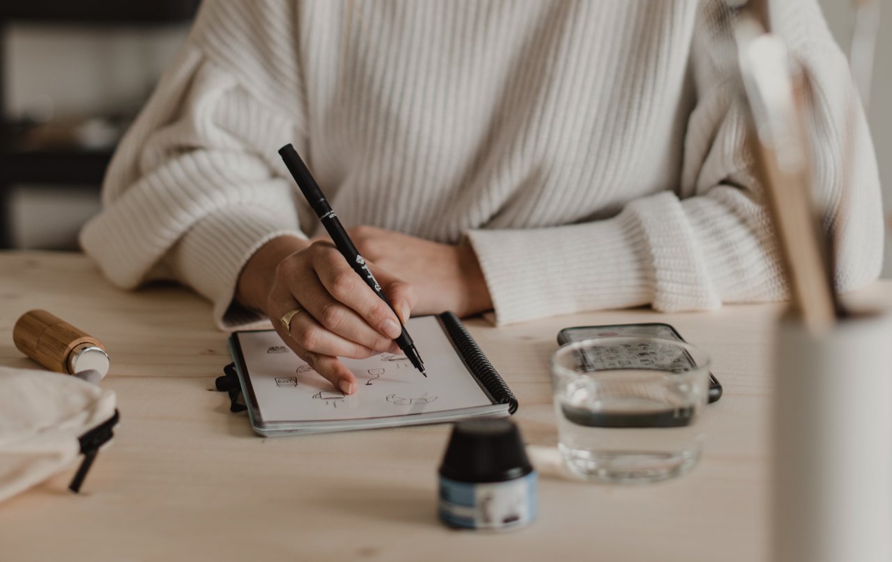 Writing in a Bambook notebook