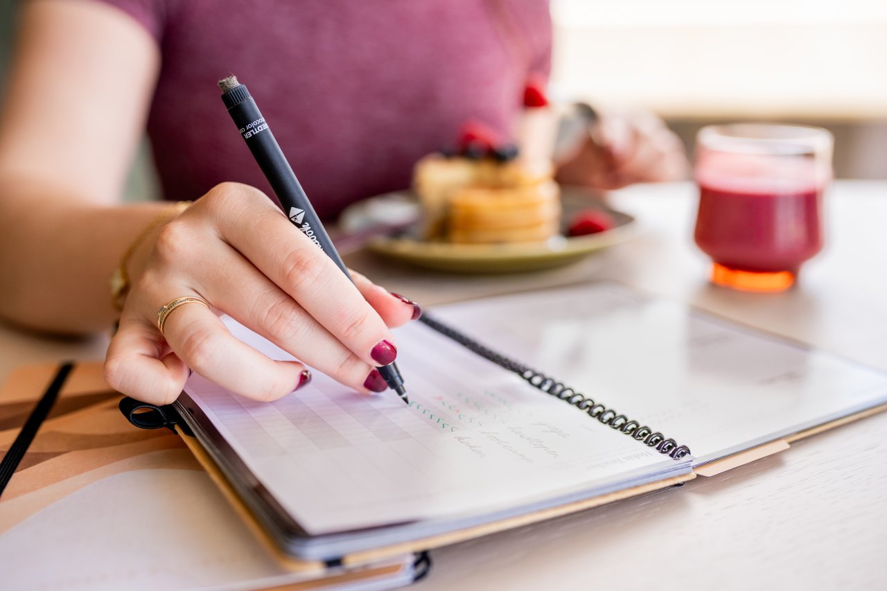 Writing in a Bambook notebook