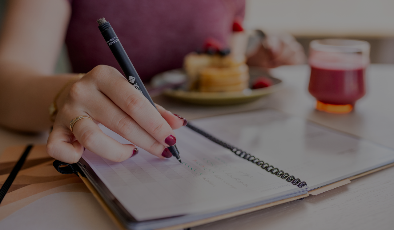 Writing in a Bambook notebook